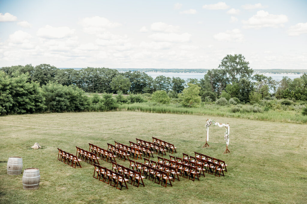 Once Finger Lakes wedding ceremony on lawn overlooking Seneca Lake